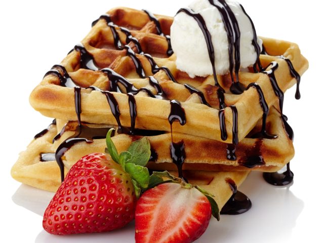 Belgium,Waffles,With,Chocolate,Sauce,,Ice,Cream,And,Strawberries,Isolated